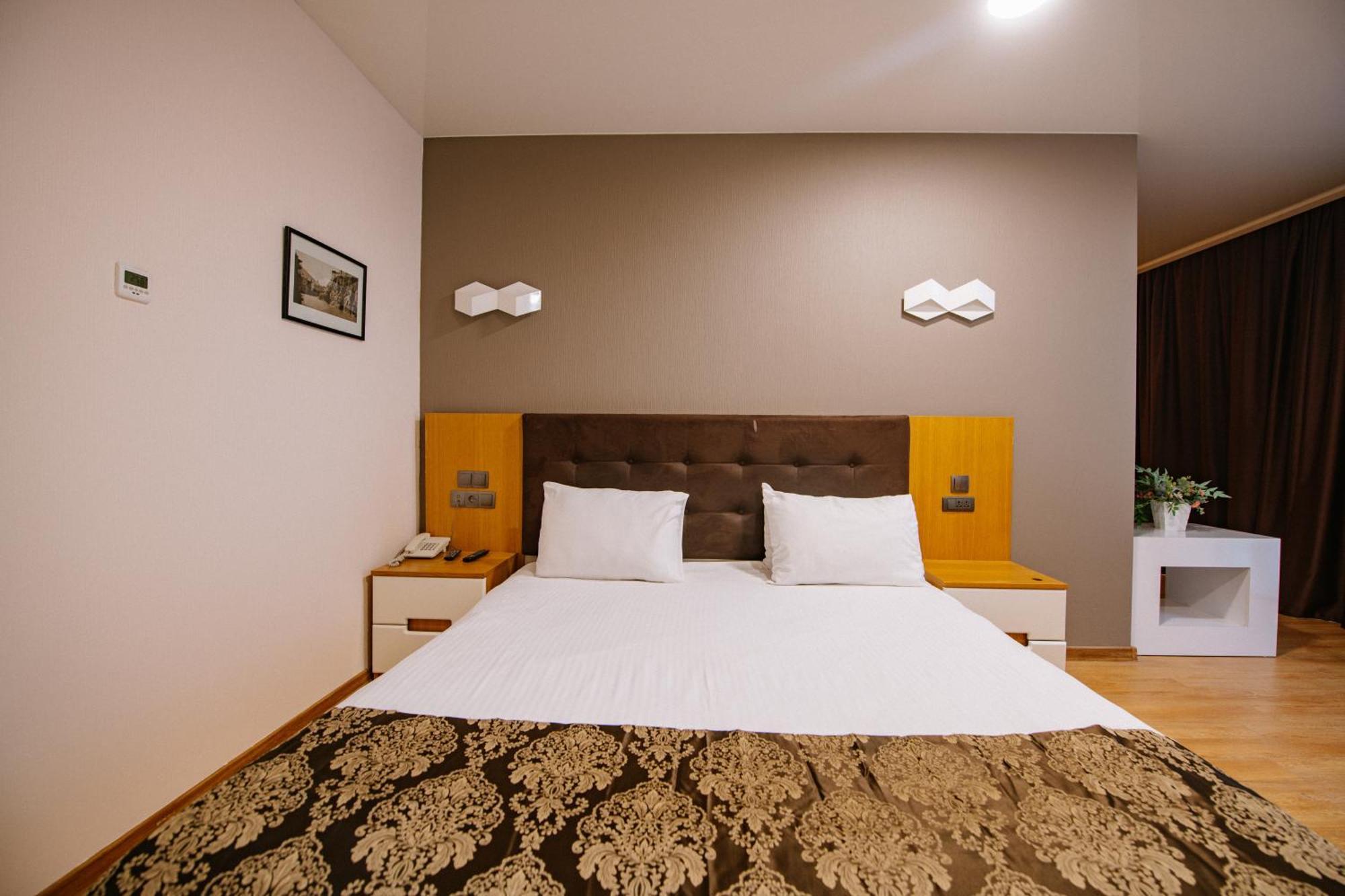 Iveria Inn Hotel Tbilisi Quarto foto