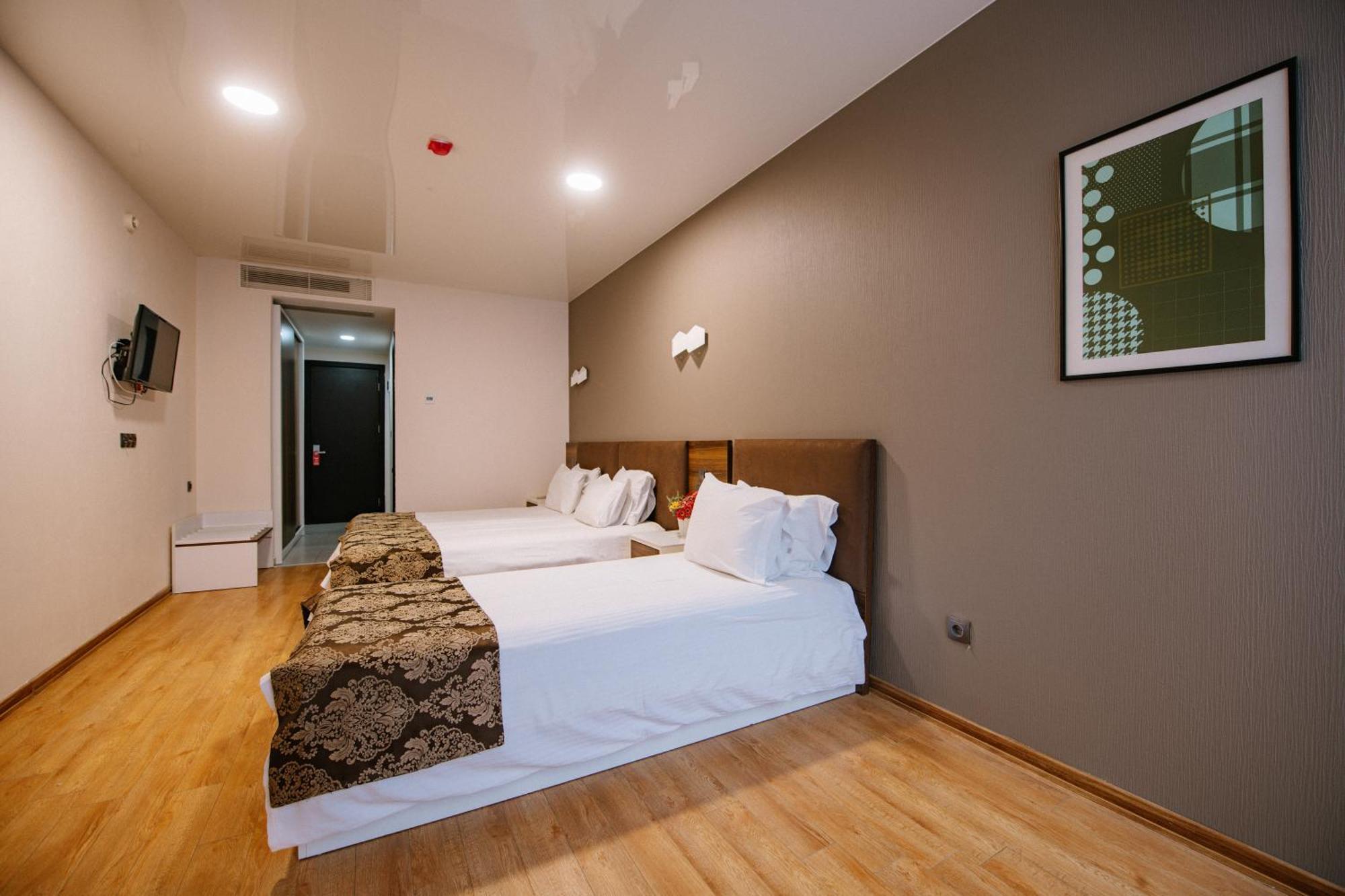 Iveria Inn Hotel Tbilisi Quarto foto