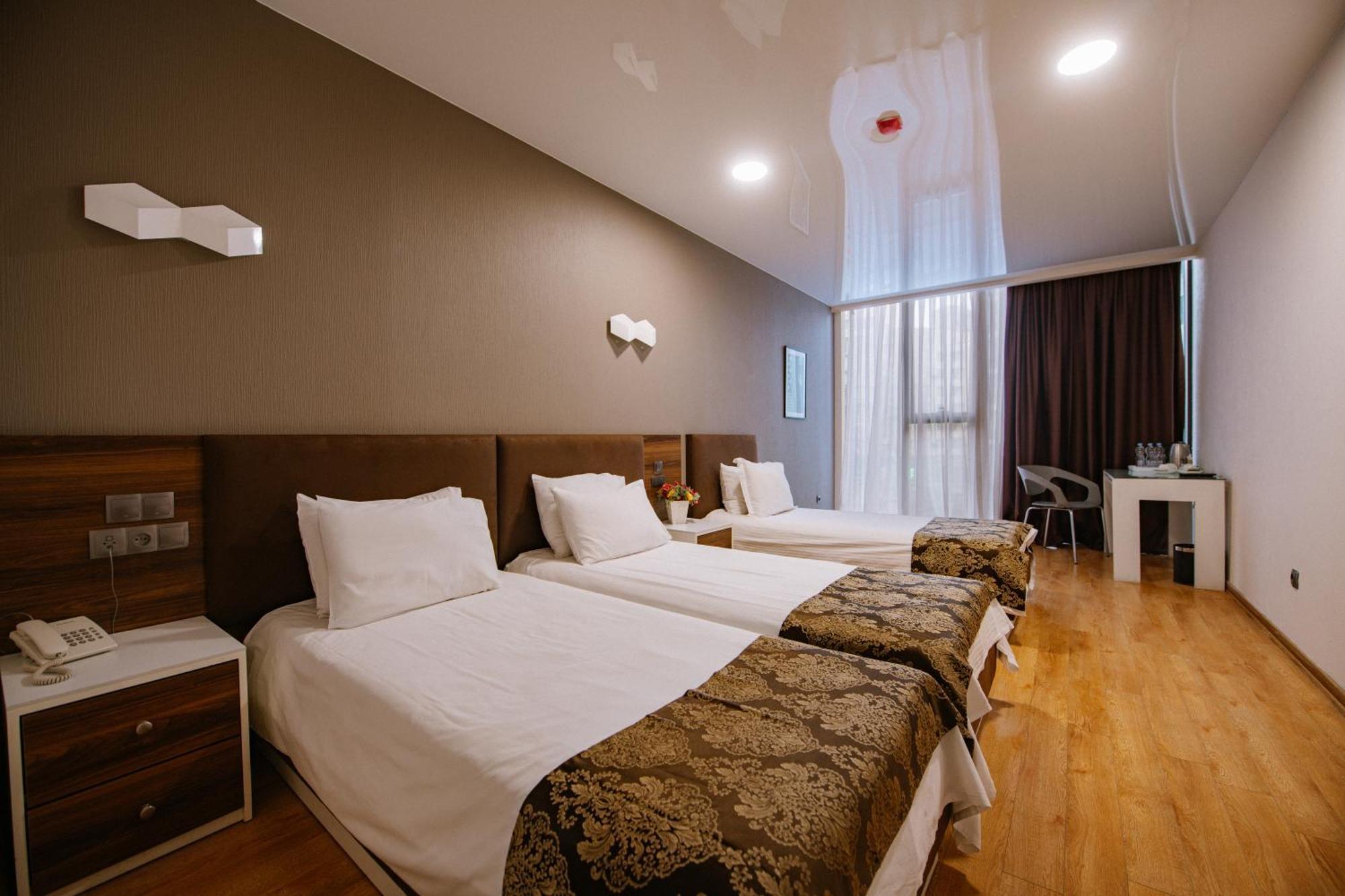 Iveria Inn Hotel Tbilisi Quarto foto